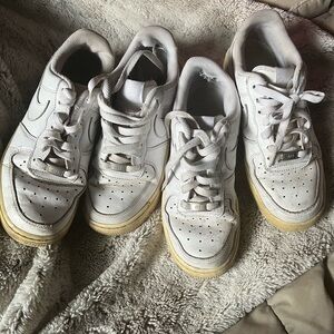two used nike air force shoes